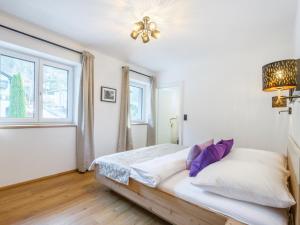 Łóżko lub łóżka w pokoju w obiekcie Roßbrand und Tauern-Blick