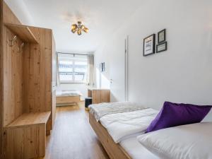 Łóżko lub łóżka w pokoju w obiekcie Roßbrand und Tauern-Blick