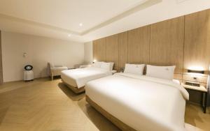 The Van Hotel客房内的一张或多张床位