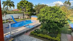 an overhead view of a swimming pool in a yard at Finca Numantia in Santa Rosa de Cabal