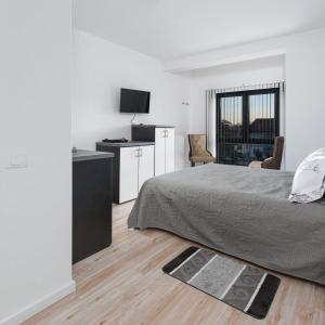 Kuchyň nebo kuchyňský kout v ubytování Fenix Apartments
