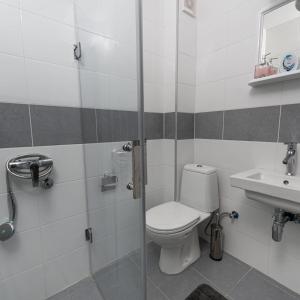 Koupelna v ubytování Fenix Apartments