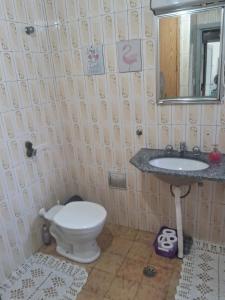 Ένα μπάνιο στο Casa terrea 4 quartos Expo SP +33 φωτογραφίες