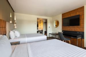 Postel nebo postele na pokoji v ubytování Hotel Real del Rio + 37 fotografií