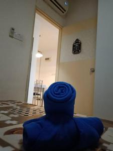 Ruang duduk di RA Homestay UUC