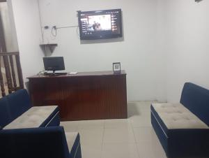 TV a/nebo společenská místnost v ubytování Hostal Tamara
