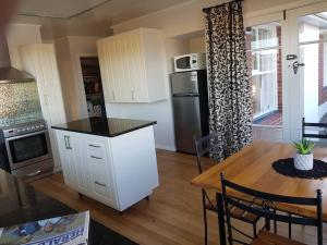 Köök või kööginurk majutusasutuses Handy Location - 3brd home!
