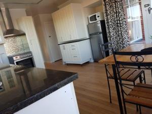 Köök või kööginurk majutusasutuses Handy Location - 3brd home!