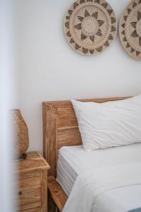 Postel nebo postele na pokoji v ubytování Gajahmina Guesthouse