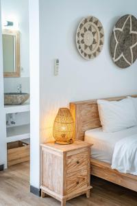 Postel nebo postele na pokoji v ubytování Gajahmina Guesthouse