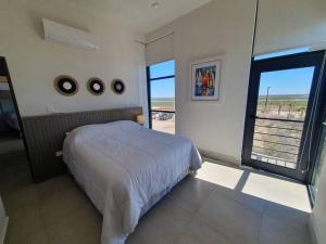 Postel nebo postele na pokoji v ubytování Hermoso condominio 3 recámaras