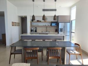 Kuchyň nebo kuchyňský kout v ubytování Hermoso condominio 3 recámaras