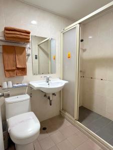 Koupelna v ubytování Hua Guo Hotel