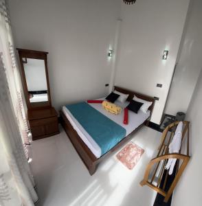 Ένα ή περισσότερα κρεβάτια σε δωμάτιο στο Ella Aura view homestay