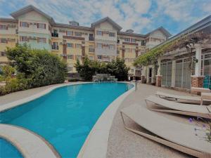 Bazén v ubytování Cloud9Condos Cebu - 1 BR Hillside Corner Unit nebo v jeho okolí