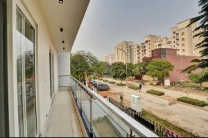 a balcony with a view of a city street at Expo View INN in Greater Noida