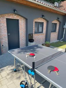 Stolní tenis v ubytování East Mountain Villa nebo okolí