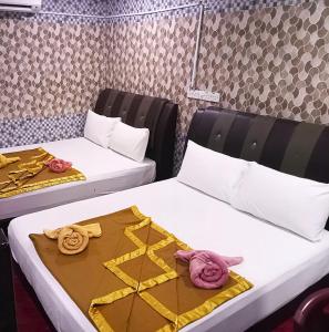 Postel nebo postele na pokoji v ubytování Damansara Damai Hotel- DD