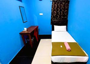Postel nebo postele na pokoji v ubytování Damansara Damai Hotel- DD