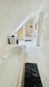 Koupelna v ubytování Orličky Apartments + 28 fotografií