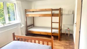 Postel nebo postele na pokoji v ubytování Orličky Apartments