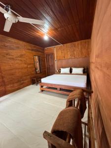 Ein Bett oder Betten in einem Zimmer der Unterkunft Sinharaja Forest Gate