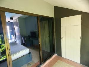 Postel nebo postele na pokoji v ubytování Momento Resort
