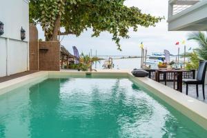 Πισίνα στο ή κοντά στο Sailors Beach House