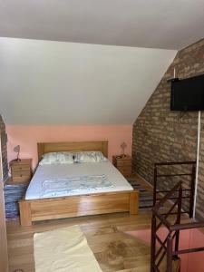 Postel nebo postele na pokoji v ubytování Guest house Pikec