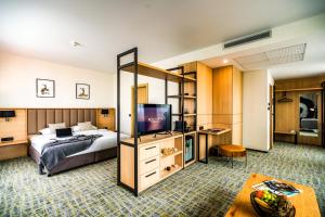 Postel nebo postele na pokoji v ubytování B1 City Hotel + 30 fotografií