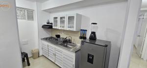 Eldhús eða eldhúskrókur á Loft Cerca al Centro Histórico - A pasos de Todo!