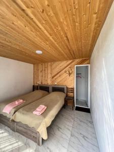 Postel nebo postele na pokoji v ubytování Ardoti Inn + 9 fotografií