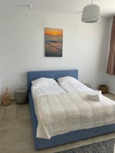Ένα ή περισσότερα κρεβάτια σε δωμάτιο στο Dimargo