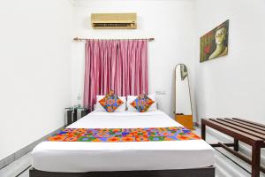 Ένα ή περισσότερα κρεβάτια σε δωμάτιο στο FabHotel Next Generation +21 φωτογραφίες