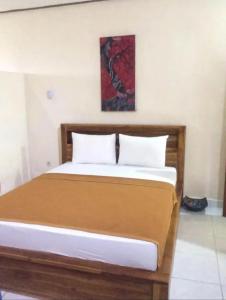 Postel nebo postele na pokoji v ubytování Holiday Villa