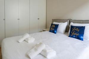 Ένα ή περισσότερα κρεβάτια σε δωμάτιο στο Il Nido - Centro Storico Lucca