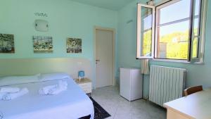 Ένα ή περισσότερα κρεβάτια σε δωμάτιο στο Edera Room and Apartment