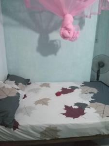 Postel nebo postele na pokoji v ubytování Nishan Villa