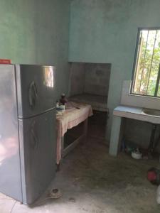 Kuchyň nebo kuchyňský kout v ubytování Nishan Villa