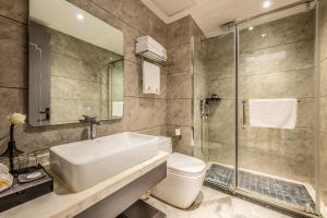 Koupelna v ubytování Bole Jing Pin Hotel