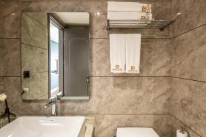 Koupelna v ubytování Bole Jing Pin Hotel