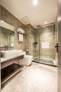 Koupelna v ubytování Bole Jing Pin Hotel