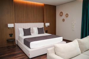 Postel nebo postele na pokoji v ubytování Supreme Hotel