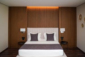 Postel nebo postele na pokoji v ubytování Supreme Hotel