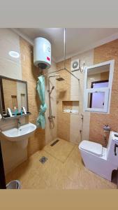 Koupelna v ubytování ريلاكس إن للشقق الفندقية Relax Inn Hotel Appartment