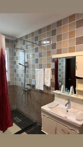 Koupelna v ubytování ريلاكس إن للشقق الفندقية Relax Inn Hotel Appartment