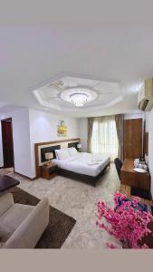 Postel nebo postele na pokoji v ubytování ريلاكس إن للشقق الفندقية Relax Inn Hotel Appartment + 22 fotografií
