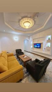 TV a/nebo společenská místnost v ubytování ريلاكس إن للشقق الفندقية Relax Inn Hotel Appartment