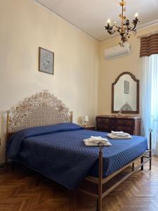 Posteľ alebo postele v izbe v ubytovaní Maman Suite, city center near Molo Beverello