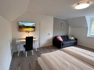 TV a/nebo společenská místnost v ubytování ITH Apartments
